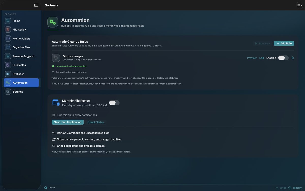 Sortmere's Automation view in dark mode. Automatic Cleanup Rules shows an "Old disk images" rule for .dmg files in Downloads older than 30 days, with Preview, Edit and an Enabled switch, plus status lines saying no automatic rules are enabled and they have not run yet. Below is a Monthly File Review reminder set for the first day of every month at 10:00 AM.